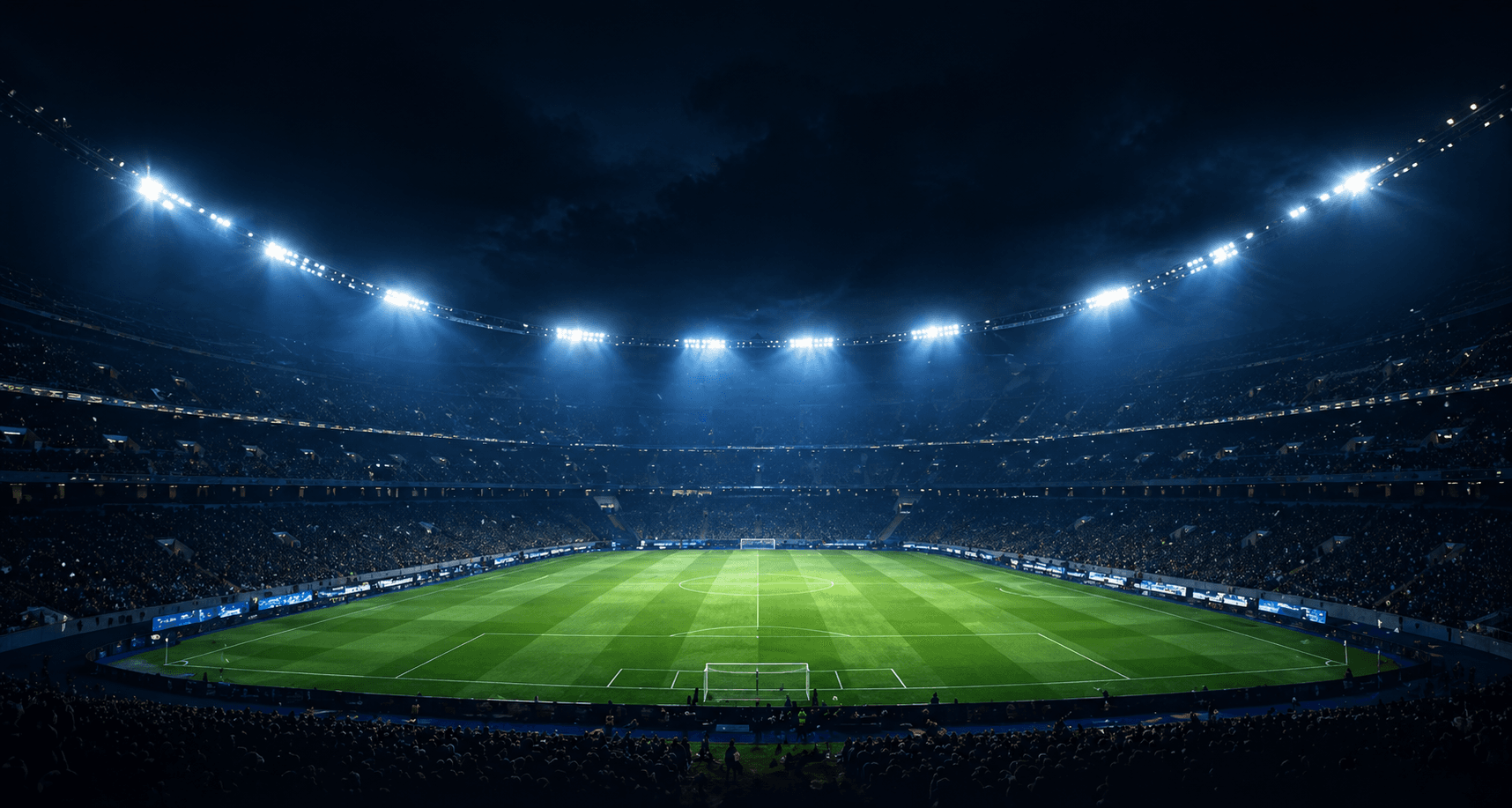 Estádio de futebol iluminado ao fundo da página de manutenção